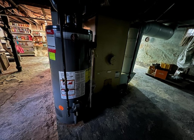 utility room featuring water heater