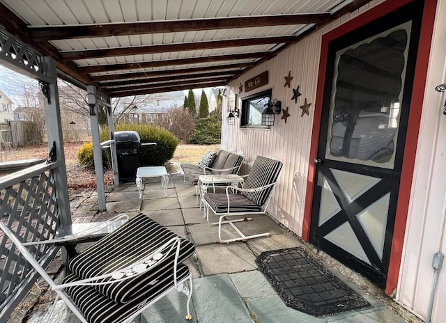 view of patio with a grill