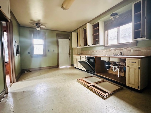 kitchen featuring backsplash, beverage cooler, and ceiling fan