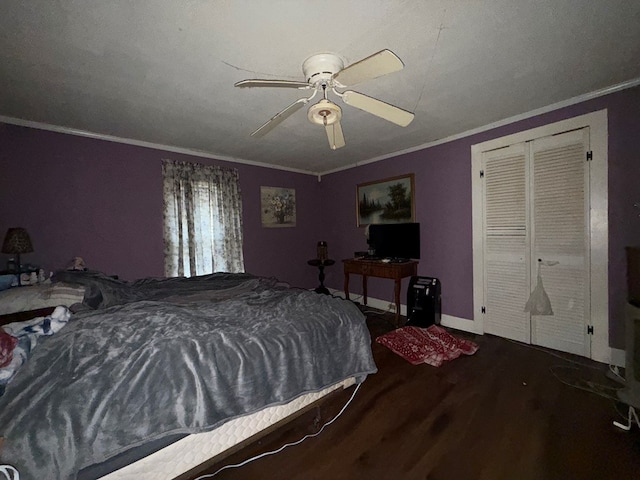 bedroom with crown molding, ceiling fan, and hardwood / wood-style flooring