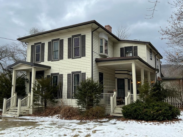 view of front of property featuring a chimney