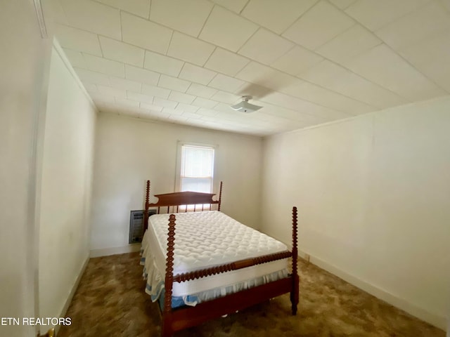 bedroom with dark carpet