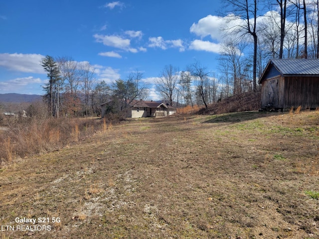 1359 Ditney Trl, Pioneer, TN 37847 - view of yard with an outdoor structure