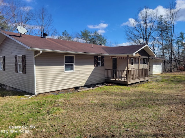 1359 Ditney Trl, Pioneer, TN 37847 - back of house with a wooden deck and a lawn