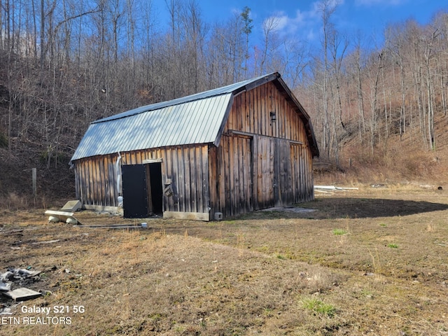1359 Ditney Trl, Pioneer, TN 37847 - view of barn with a wooded view