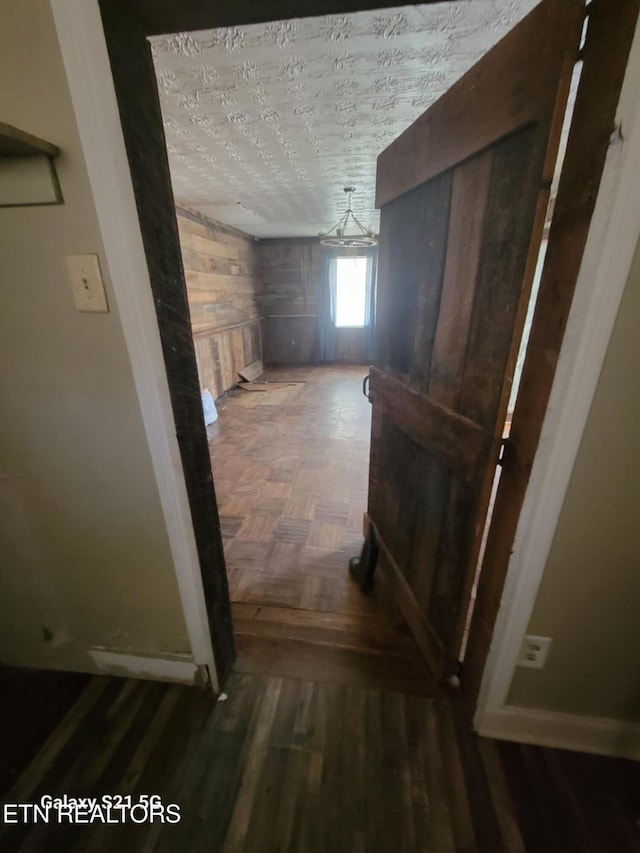 1359 Ditney Trl, Pioneer, TN 37847 - corridor with wooden walls and a textured ceiling