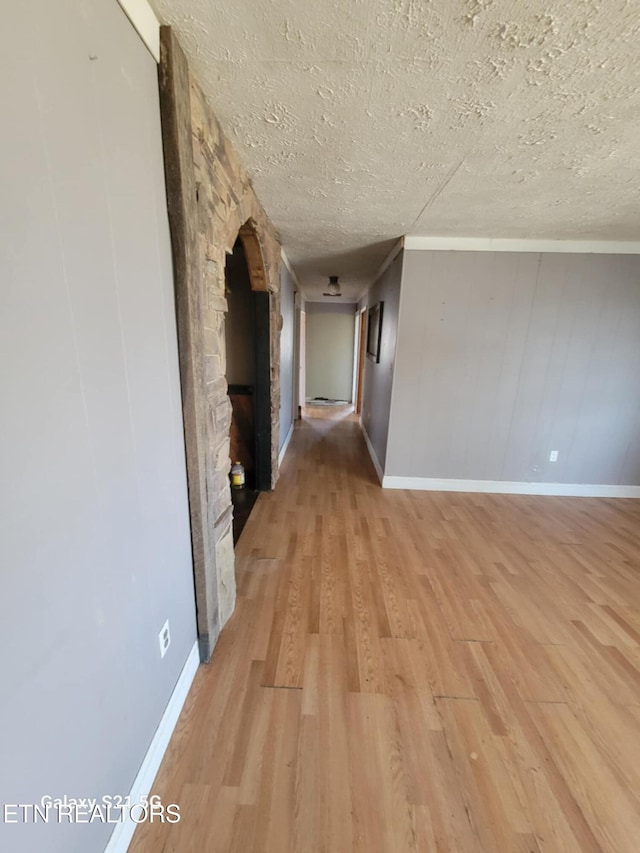 1359 Ditney Trl, Pioneer, TN 37847 - corridor featuring light wood-type flooring and a textured ceiling