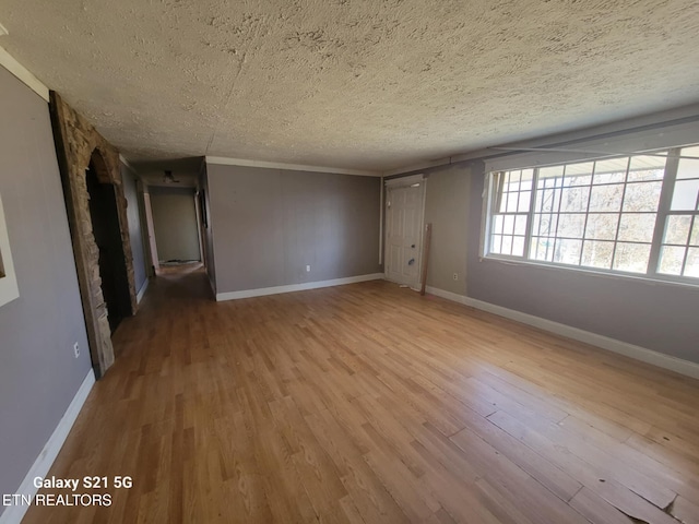 1359 Ditney Trl, Pioneer, TN 37847 - unfurnished room with a textured ceiling and wood finished floors