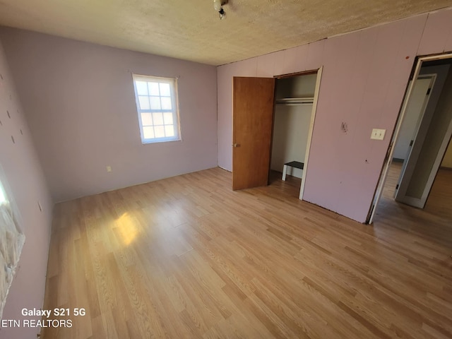 1359 Ditney Trl, Pioneer, TN 37847 - unfurnished bedroom with light wood finished floors and a closet