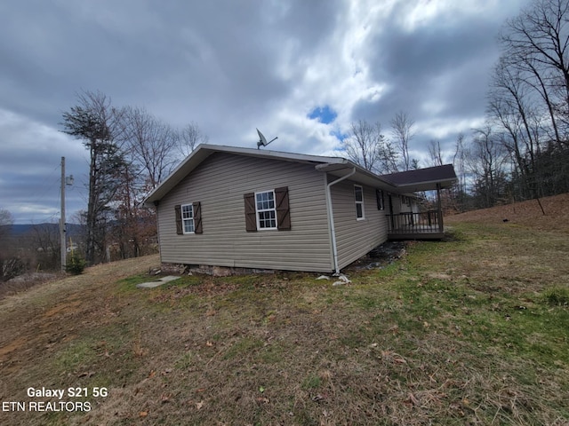 1359 Ditney Trl, Pioneer, TN 37847 - view of side of home featuring a wooden deck and a yard