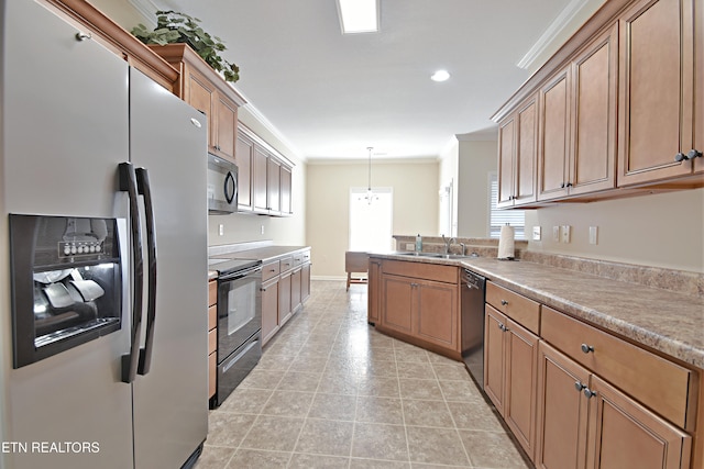 kitchen featuring decorative light fixtures, ornamental molding, a sink, a peninsula, and appliances with stainless steel finishes