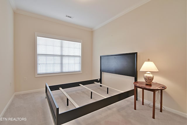bedroom featuring carpet flooring, crown molding, and baseboards