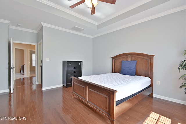 bedroom with baseboards, visible vents, ornamental molding, and dark wood-style flooring