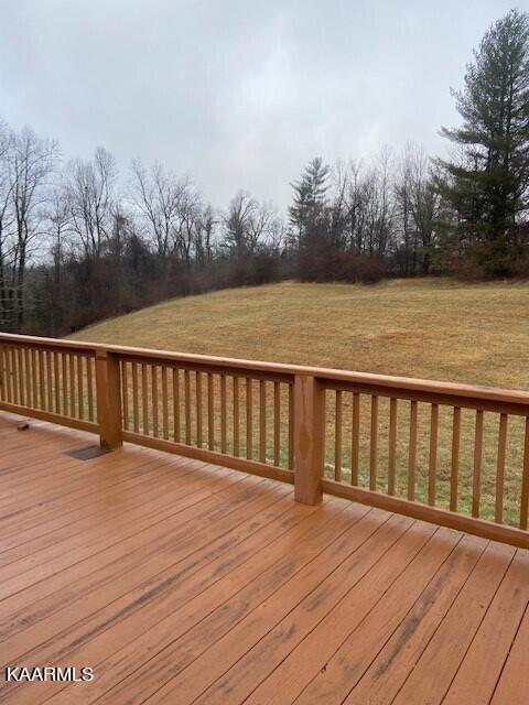 deck featuring a yard