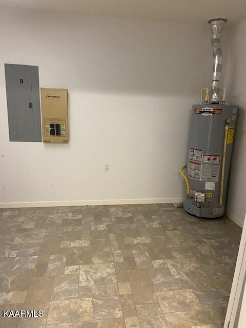 utility room featuring gas water heater