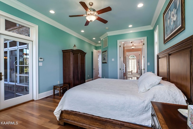 bedroom featuring crown molding, ceiling fan, and dark wood-type flooring