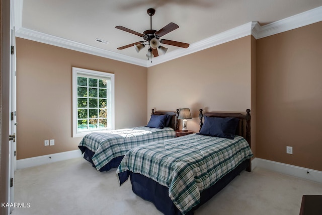 bedroom with ornamental molding, ceiling fan, and light colored carpet