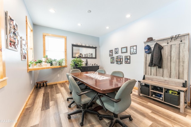 dining area with light wood-type flooring