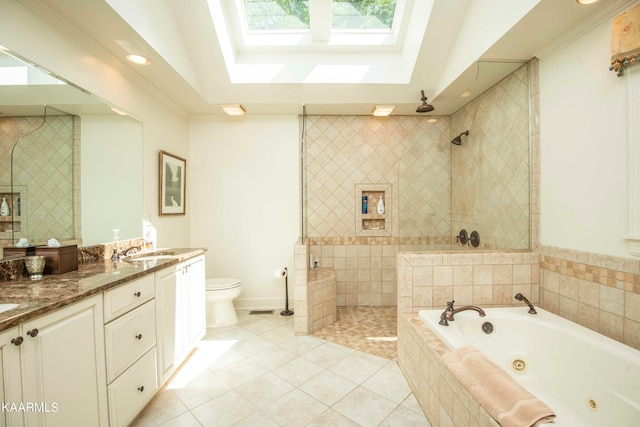 full bathroom with plus walk in shower, a skylight, tile patterned flooring, and vanity