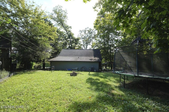 view of yard featuring a trampoline