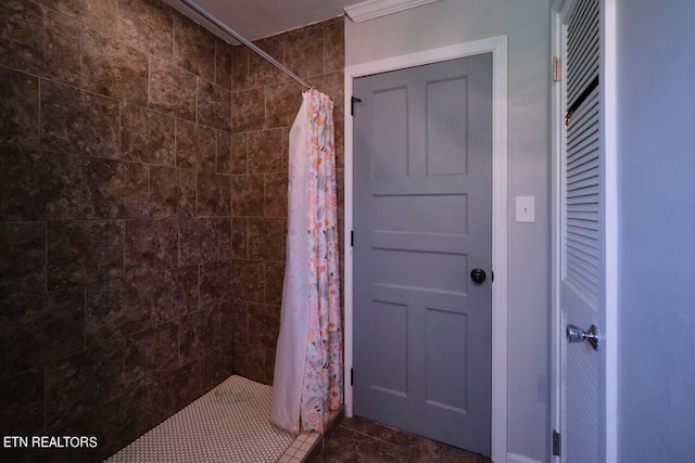 bathroom with a shower with curtain