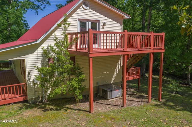 rear view of house with a deck