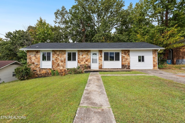 ranch-style house with a front lawn