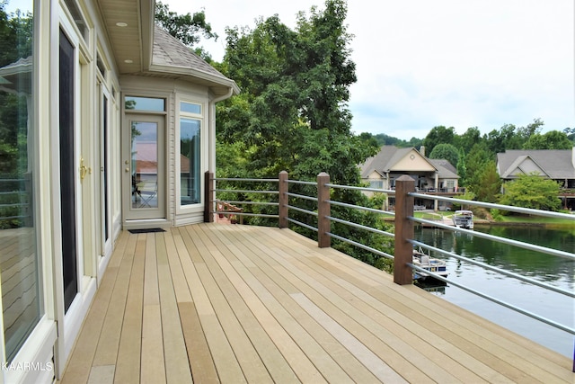 deck featuring a water view