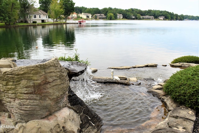 view of property view of water