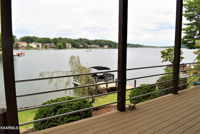 deck featuring a water view