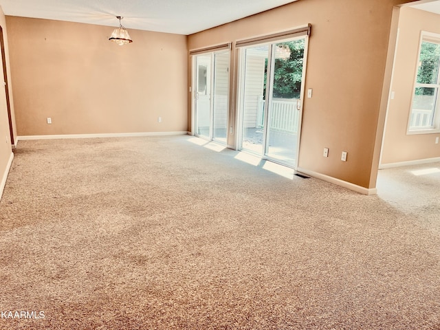 view of carpeted spare room