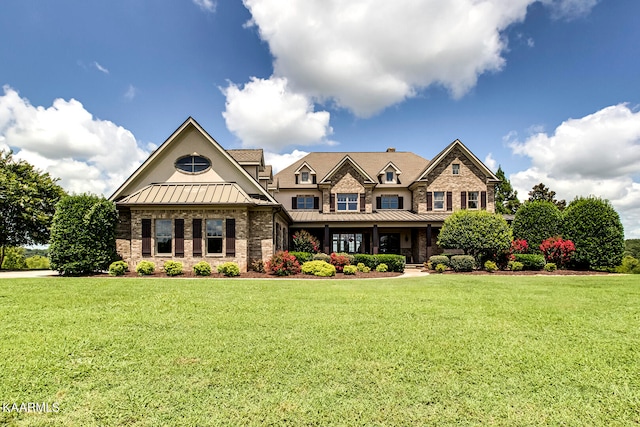 view of front of home featuring a front lawn