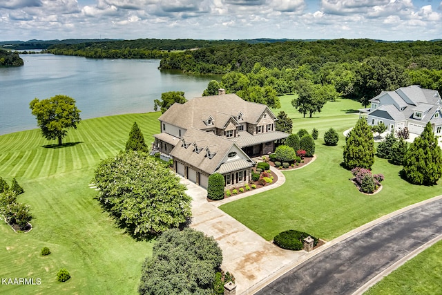 drone / aerial view with a water view