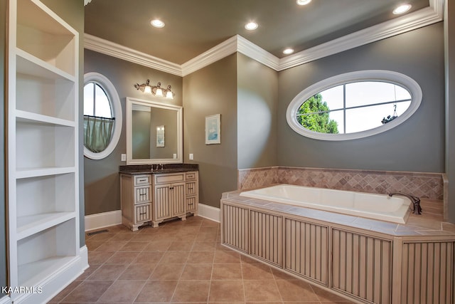 bathroom featuring a relaxing tiled tub, vanity, crown molding, and tile patterned flooring