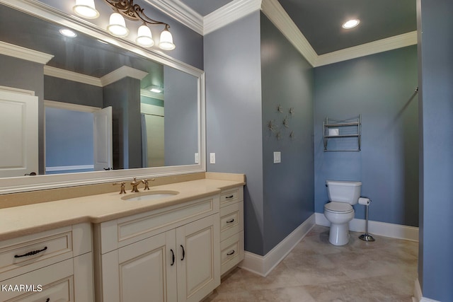 bathroom featuring ornamental molding, vanity, and toilet