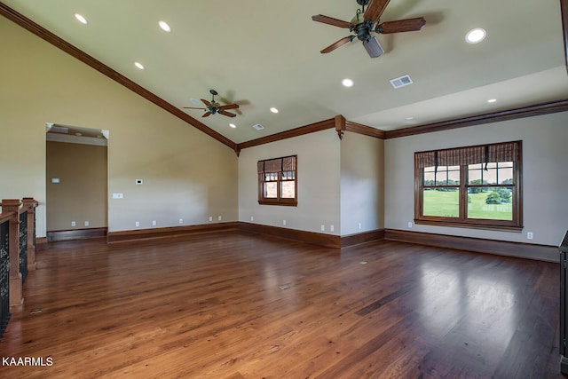 unfurnished living room with ceiling fan, ornamental molding, lofted ceiling, and dark wood-type flooring