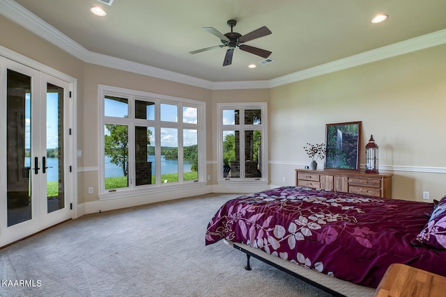 carpeted bedroom featuring crown molding, a water view, ceiling fan, and access to exterior