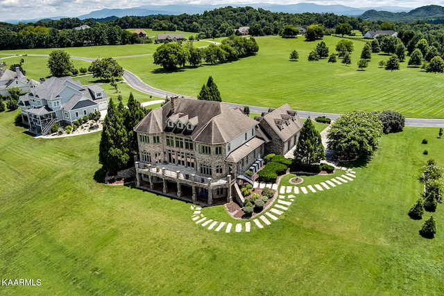 birds eye view of property with a rural view and a mountain view