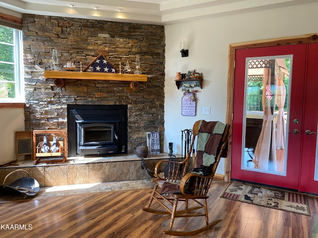 living area with hardwood / wood-style floors