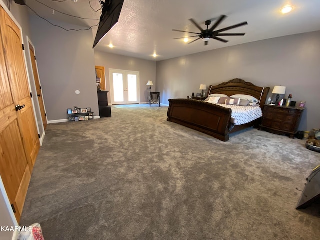 carpeted bedroom with ceiling fan, french doors, and a closet