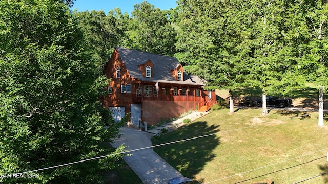 view of front of property with a front lawn and a porch