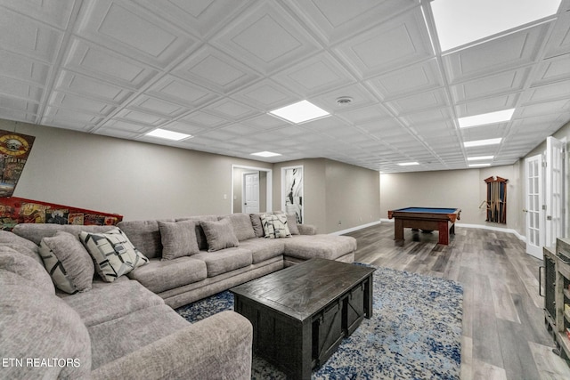 living room with hardwood / wood-style floors and pool table