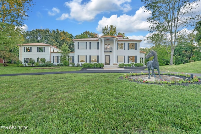 view of front of house with a front yard