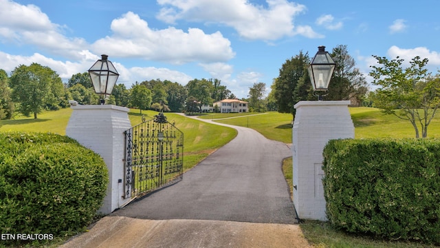 surrounding community featuring a lawn