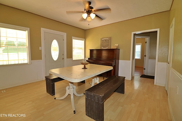 dining room featuring ceiling fan and light wood-type flooring