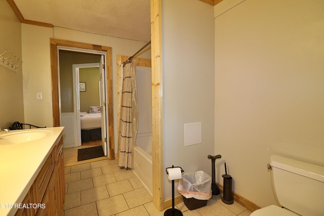 full bathroom featuring toilet, shower / bath combo, tile floors, and vanity