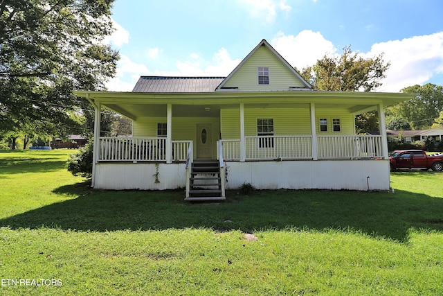 view of front of home featuring a front lawn and a porch