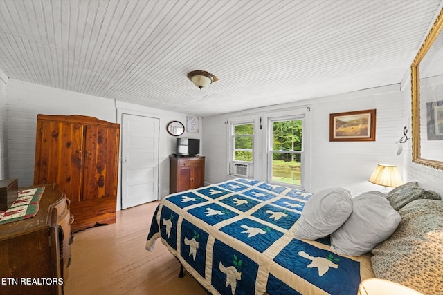 bedroom with light hardwood / wood-style flooring