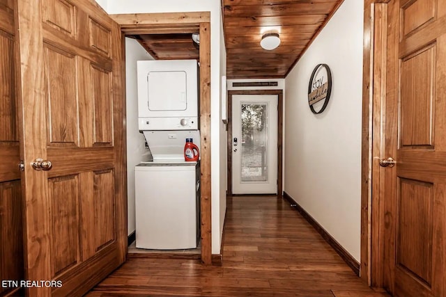 107 Dream Way, Sevierville, TN 37876 - laundry area featuring dark hardwood / wood-style flooring, wooden ceiling, and stacked washer / dryer