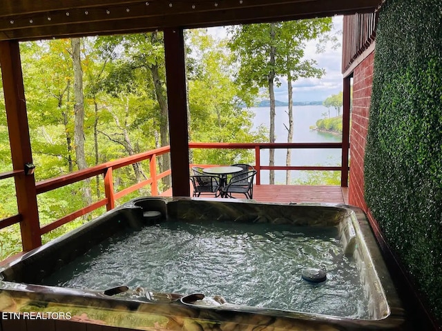 107 Dream Way, Sevierville, TN 37876 - interior space with a deck with water view and an outdoor hot tub